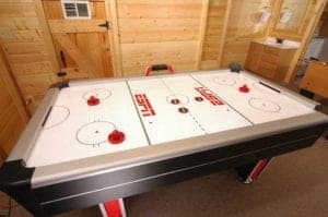 A fun air hockey table in the game room of a Gatlinburg cabin.