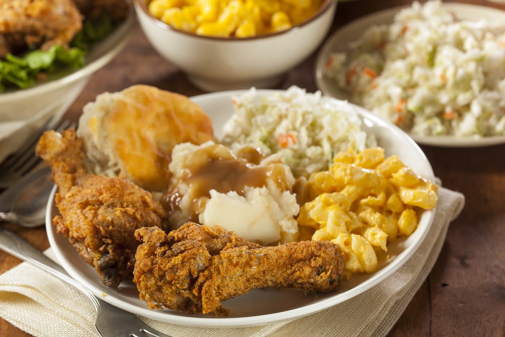 fried chicken, mac and cheese, mashed potatoes and gravy, coleslaw, and biscuit